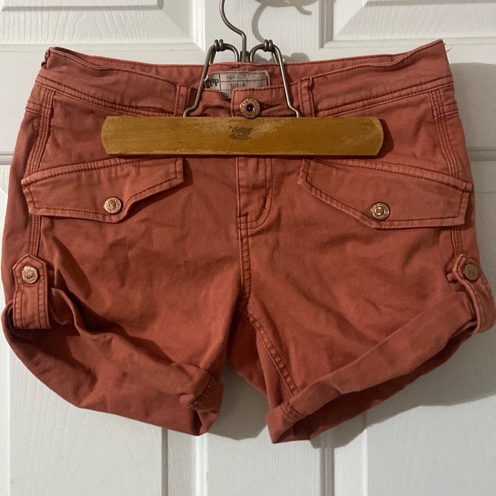 Free People pink salmon shorts with rose gold buttons